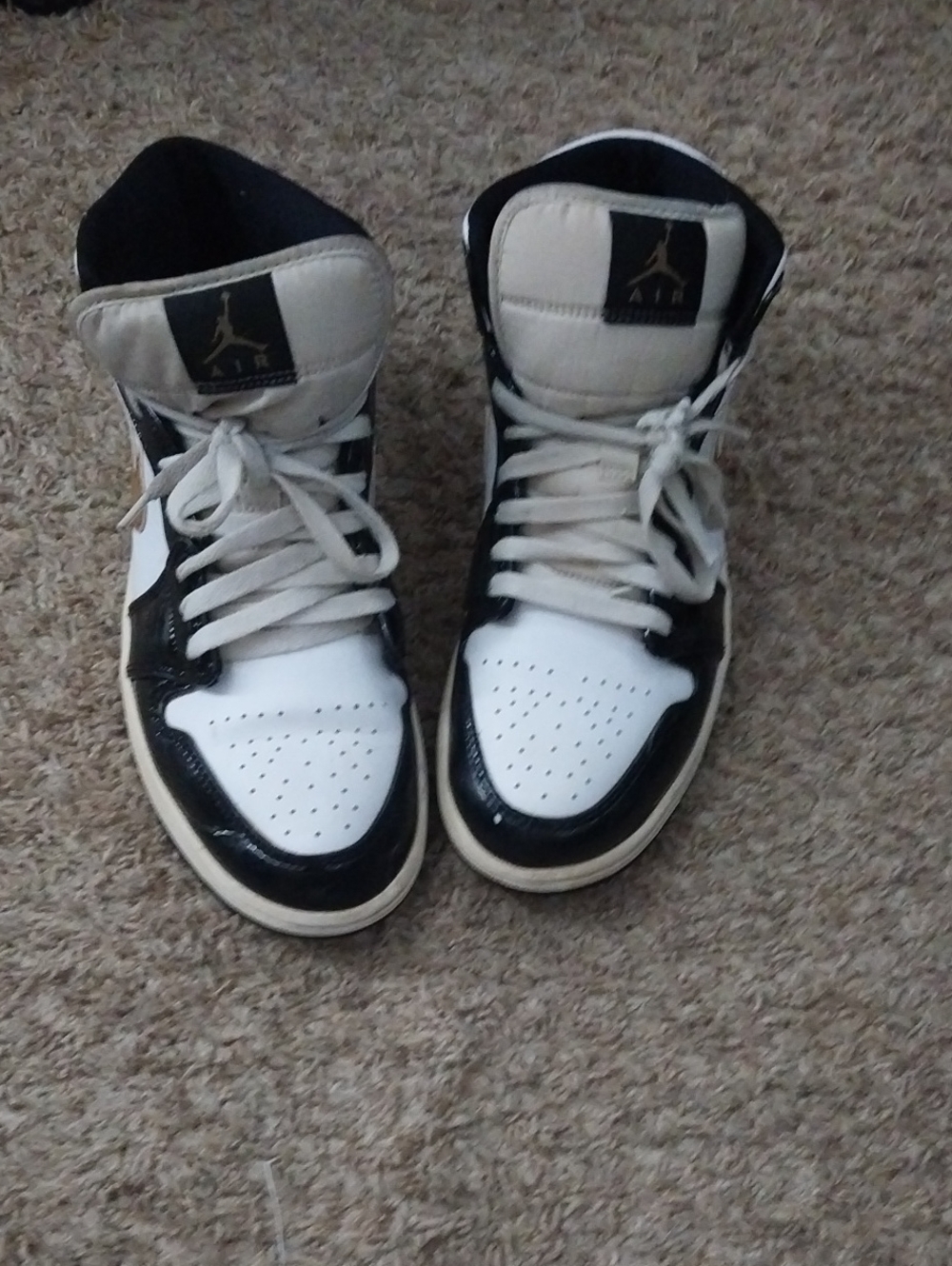 Jordan Men’s Black and White High-Top Sneakers
